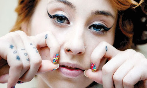 Cute Nail Art Girl With Nice Knuckle Finger Tattoo Designs