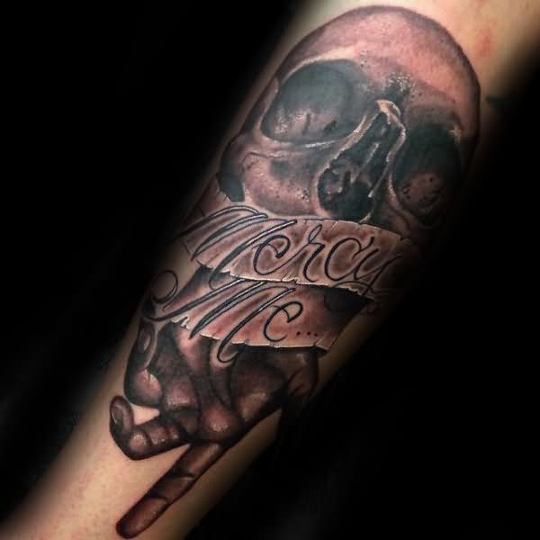 Horrible Grey Ink Skull and Mercy Me Banner Tattoo Design For Men Forearm