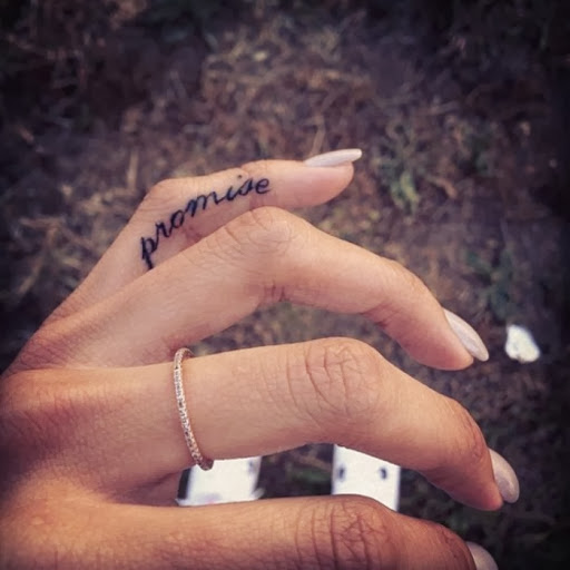 Impressive Black Ink Promise Finger Tattoo Design For Women