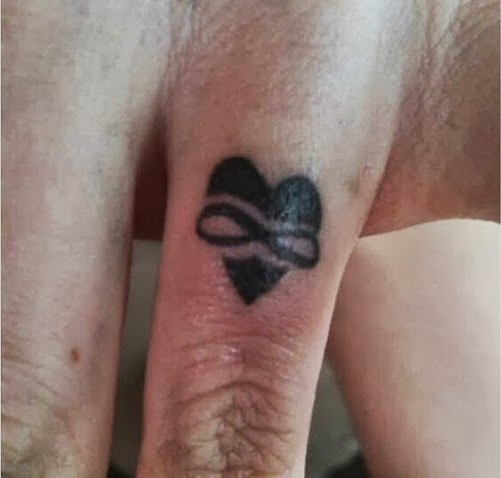 Outstanding Small Heart Infinity Black Ink Tattoo On Ring Finger