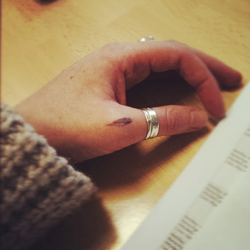 Small Black Ink Finger Tattoo Design For Women Thumb