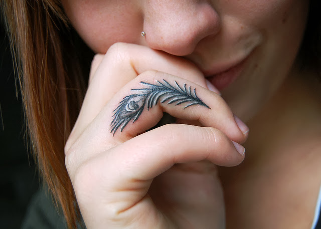 Ultimate Peacock Feather Tattoo On Girl Ring Finger