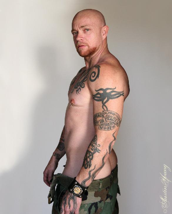Awesome Buck Angel With His Banner Tattoo On Upper Sleeve