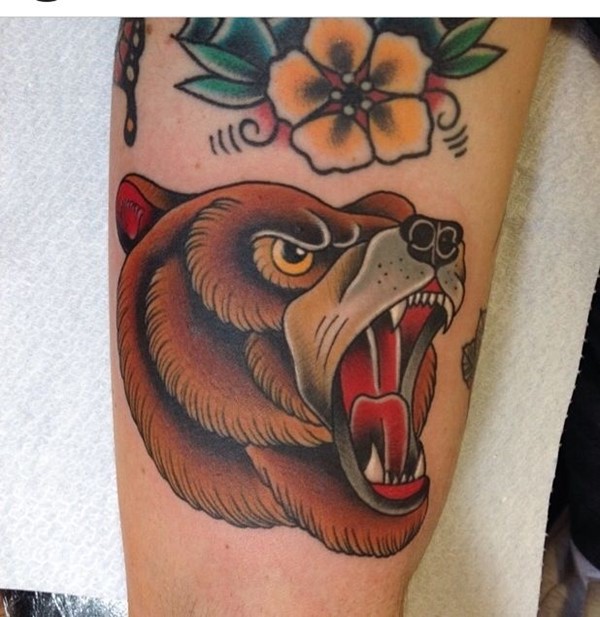 Awesome Brown Ink Bear Head And Yellow Flower Tattoo For Sleeve