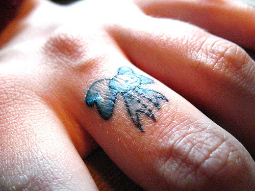 Beautiful Small Bow Tattoo Design For Women Finger