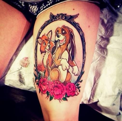 Cute Colorful Animated Dog Couple Lily Flower Mirror Tattoo On Women Thigh