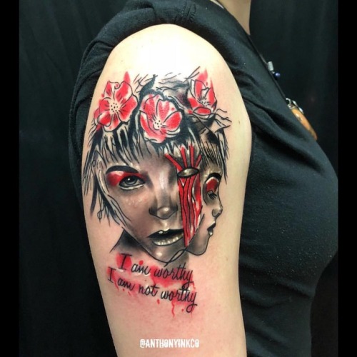 Nice Asian Girl Face Bipolar Tattoo On Shoulder