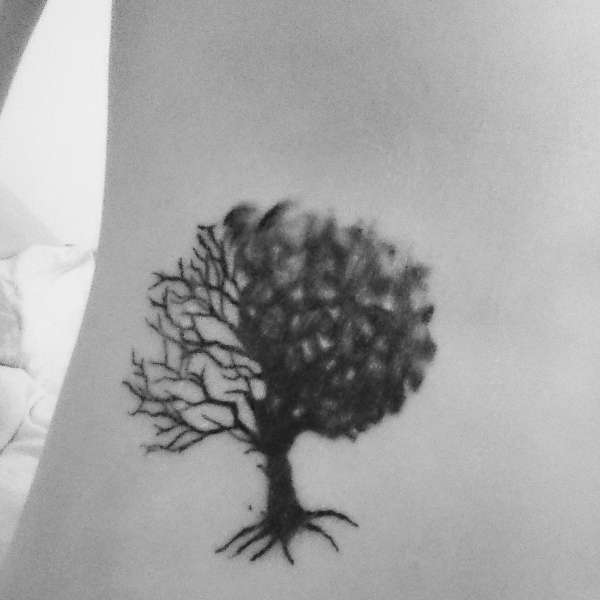 Nice Bipolar Tattoo Design Of Green and Dry Tree