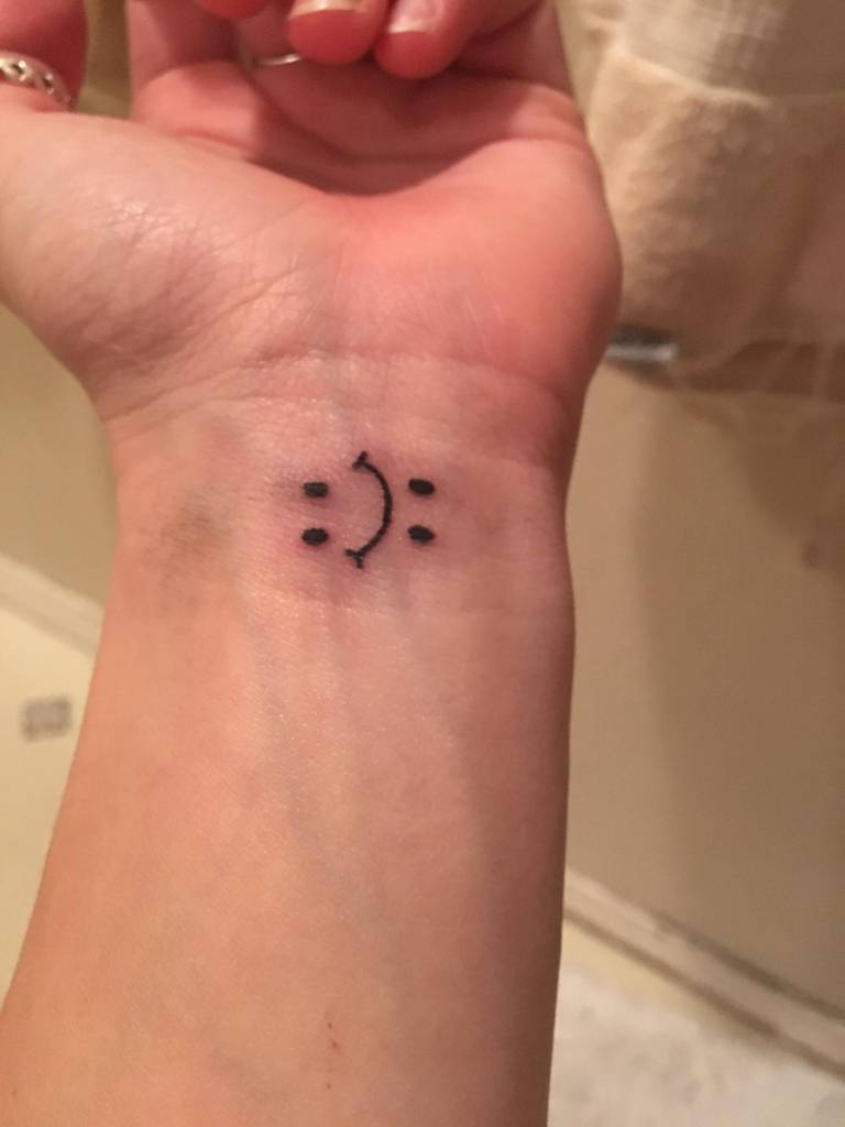 Sad And Happy Face Emoji Bipolar Tattoo On Wrist
