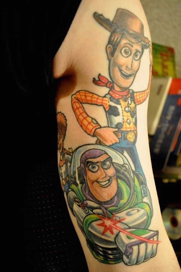 Wonderful Animated Toy Story Cartoon Film Tattoo For Men Back Arm